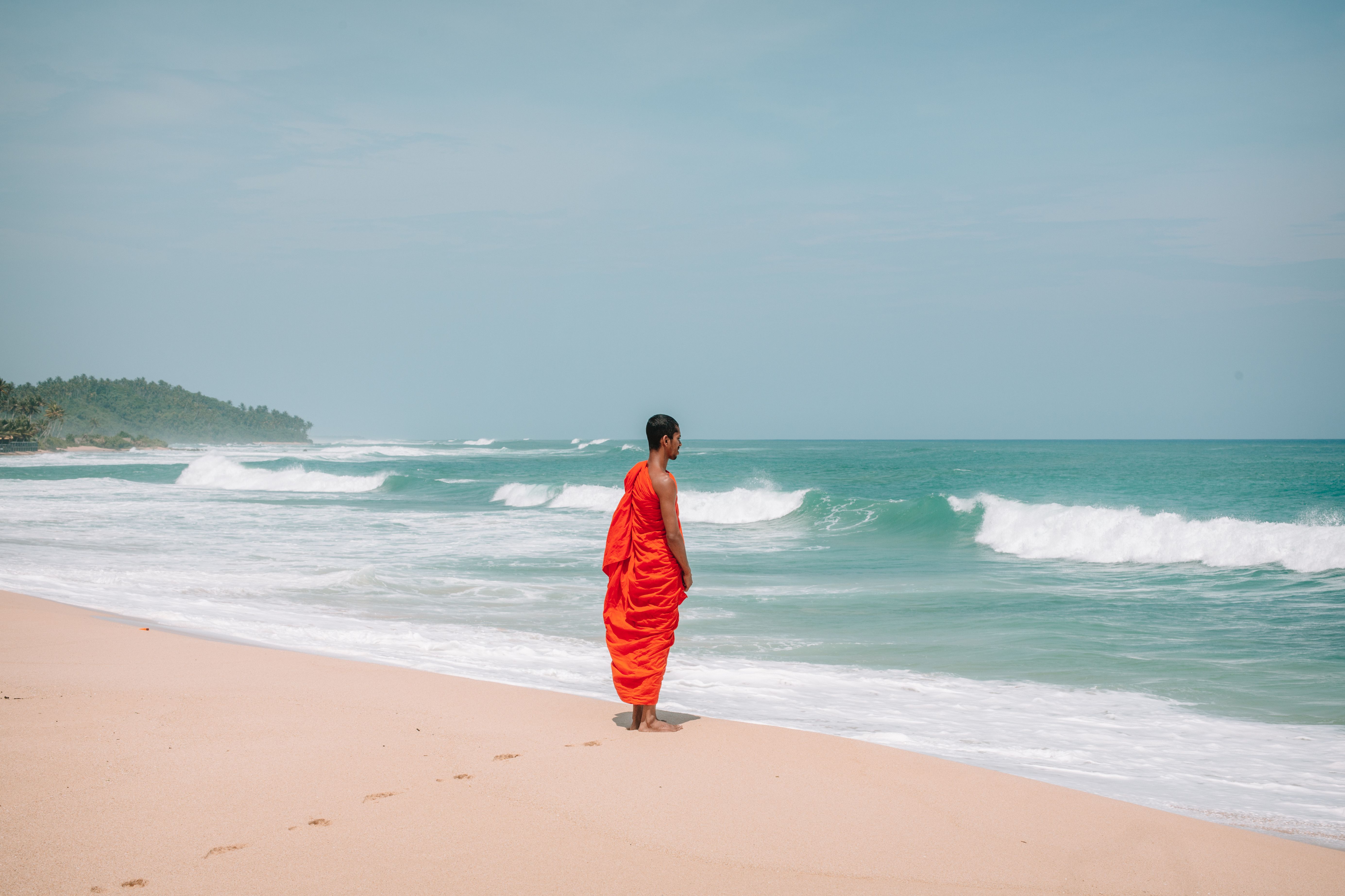 Sri Lankan Buddhist monk beside the coast
